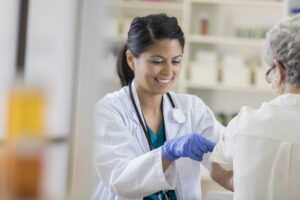 Nurse giving a patient a vaccination