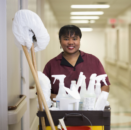 Hospital janitor working in a hallway