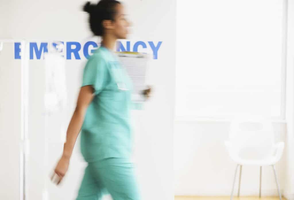 LVN walking through hospital
